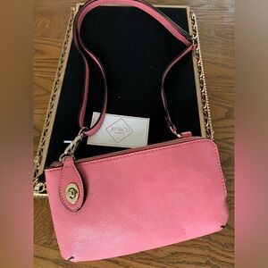 Mini Coral purse; the Kendall wristlet; clutch.